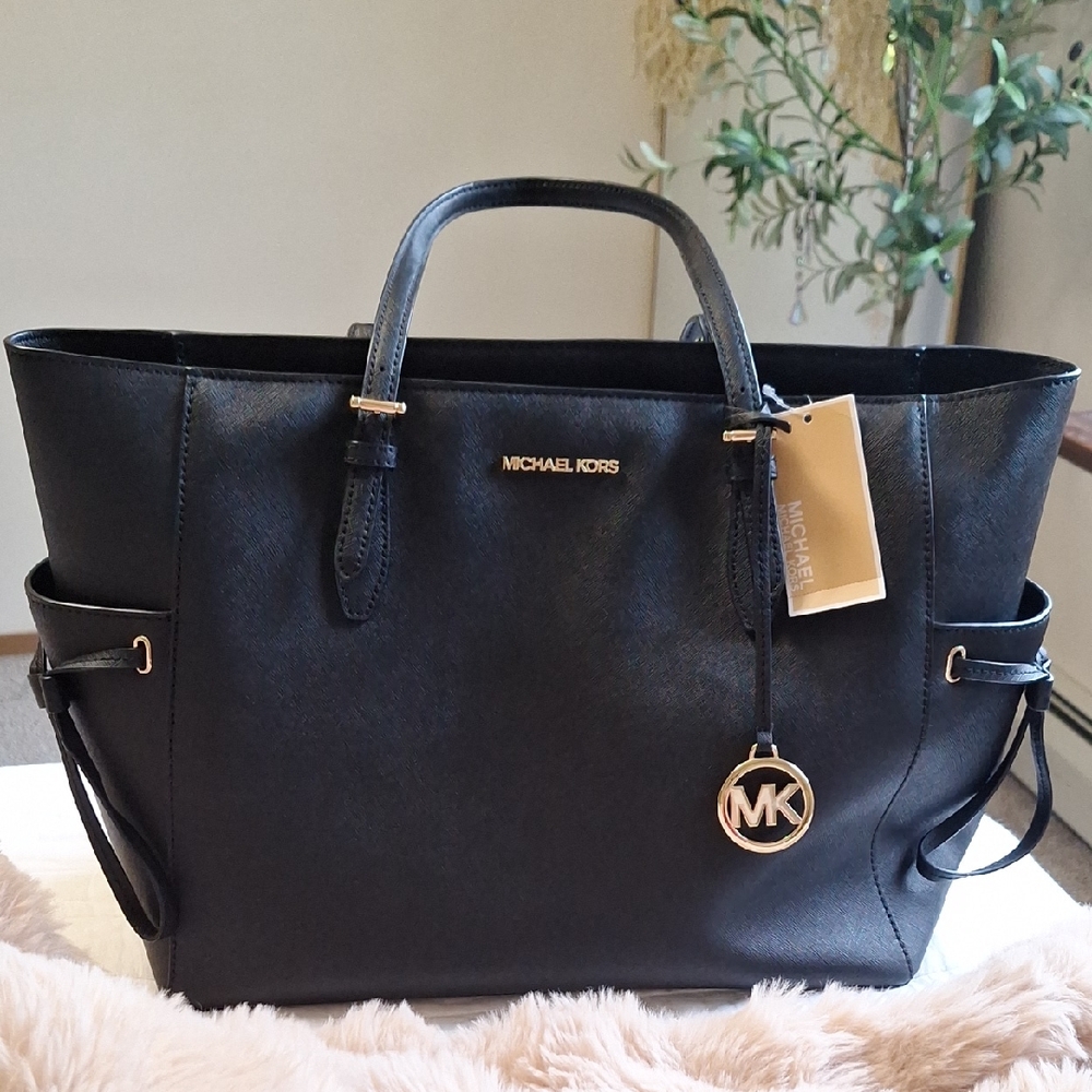 Michael Kors Black Leather Shoulder Bag with Gold Accents!
